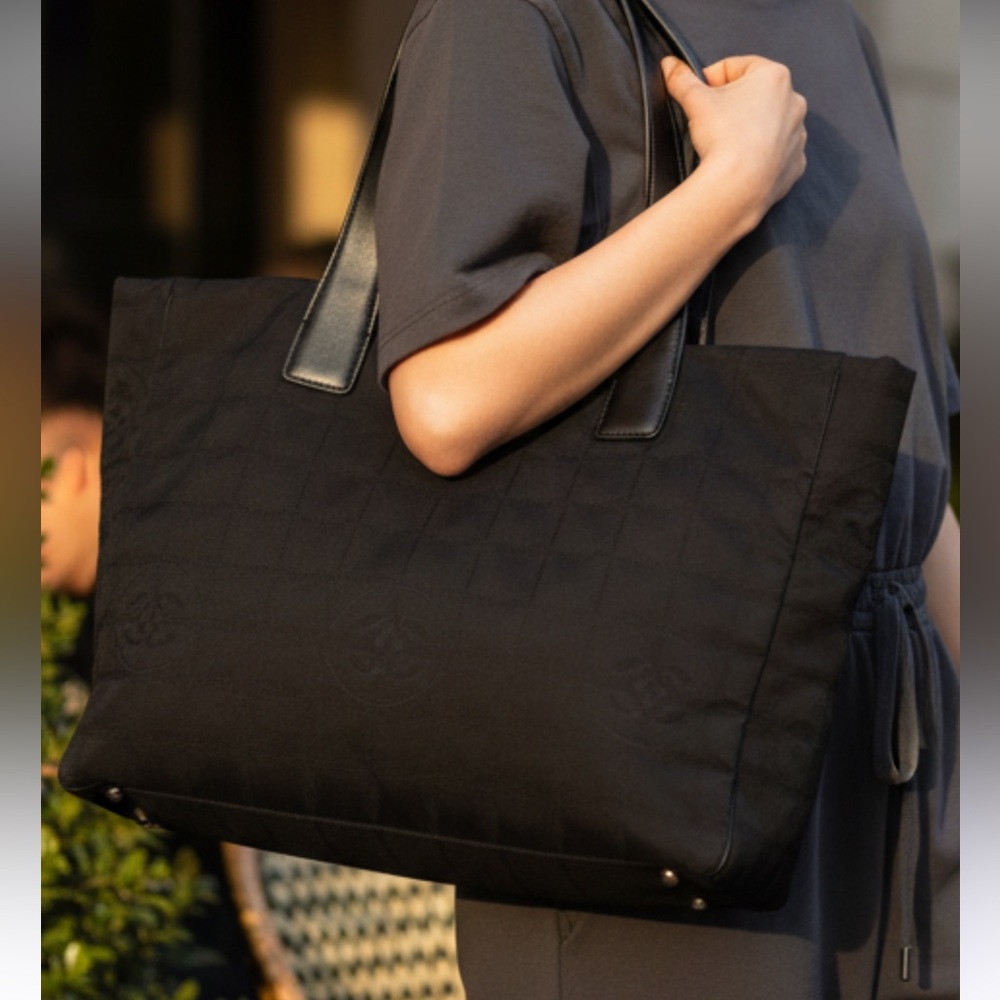 Chanel Black Tote Bag comes with an Authenticity Card